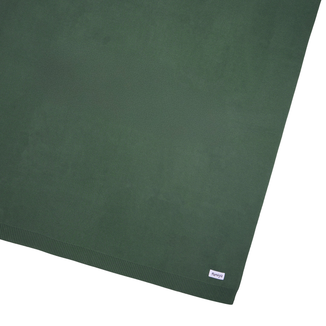Green Namelyco blanket ready to personalise with name.